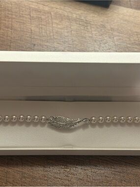 Swarovski White Pearl Bracelet with Silver Feather Clasp